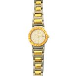 A lady's Bvlgari steel and gold bracelet wristwatch, the signed circular silvered dial with gilt,