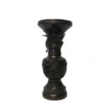 A Chinese large bronze vase, 19th/20th century, of baluster form with trumpet neck,