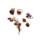 A group of mostly Oriental gold and synthetic ruby set jewellery, comprising; two solitaire rings,