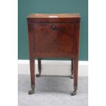 A George III inlaid mahogany dome top cellarette, with fitted interior, on tapering square supports,