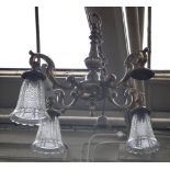 A pair of silvered metal four branch chandeliers, modern,