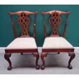 A pair of 19th century Portuguese carved rosewood dining chairs,