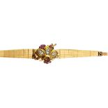 A lady's 9ct gold, ruby and diamond set Josarn cocktail bracelet wristwatch,