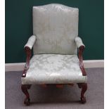 A late George III mahogany framed Gainsborough chair, on claw and ball feet (a.f.