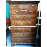 A mid-18th century walnut chest on chest, of three short over six long drawers, on bracket feet,