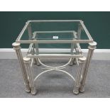 A nest of two 20th century glass top occasional tables,