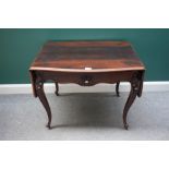 A Victorian rosewood sofa table, with shaped top and frieze drawer, on carved cabriole supports,