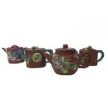 A group of four Chinese Yixing teapots and covers, 19th/20th century, of various forms,
