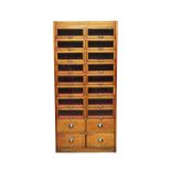 PREMIER SHOPFITTERS LTD GLASGOW; a mid-20th century oak haberdashery cabinet,