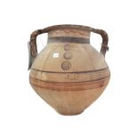 A pottery two handled jar, possibly South American, with banded and geometric decoration, 34cm high,