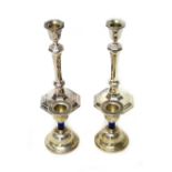 A pair of silver table candlesticks, each of octagonal form, raised on an octagonal foot,