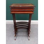 An Edwardian rosewood banded mahogany nest of three occasional tables, on turned supports,