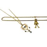 A 9ct gold and sapphire set pendant, designed as an articulated clown,