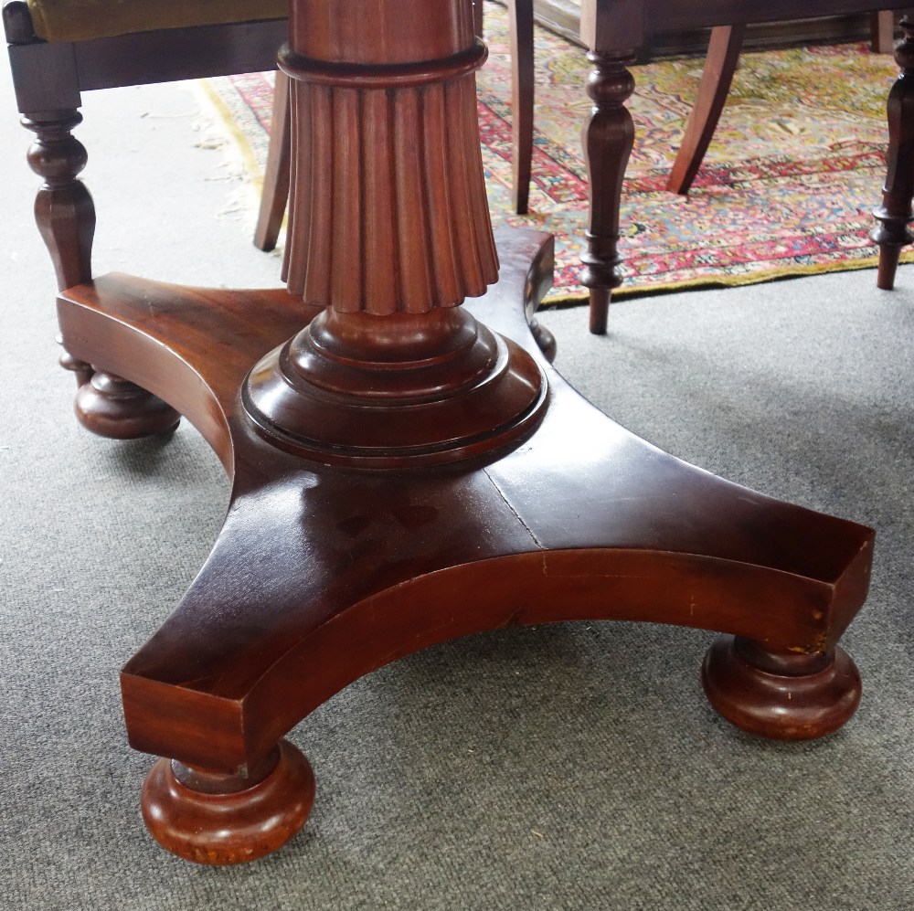 A Regency style mahogany twin section dining table, on flared fluted column and quatrefoil platform, - Image 3 of 3