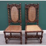 A pair of late 17th century style carved oak side chairs,