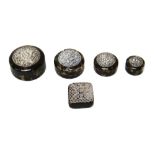 Four Balinese silver mounted tortoiseshell circular boxes and another square box, (5).