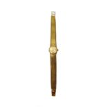 A lady's 9ct gold Bulova bracelet wristwatch,