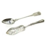 A silver fiddle pattern serving spoon, crest engraved, Exeter 1819,