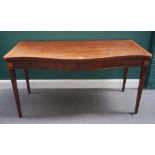 A George III inlaid mahogany serpentine serving table on tapering square supports,