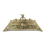 An Edwardian pierced brass rectangular desk stand,