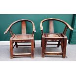 A pair of 19th century Chinese red painted softwood horseshoe back chairs, on block supports,