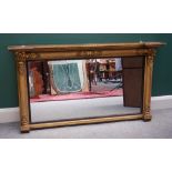 A William IV gilt framed rectangular overmantel mirror, with split column decoration,