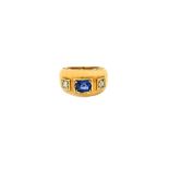 A gold, synthetic sapphire and diamond set three stone ring,