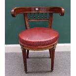 A 19th century French gilt metal mounted mahogany tub back desk chair, on tapering fluted supports,