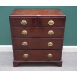 A George III mahogany chest of two short and three long drawers, on bracket feet,