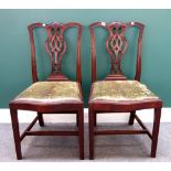 A set of eight George III style pierced vase back dining chairs,
