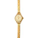 A lady's 9ct gold circular cased Marvin wristwatch,