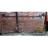 A wrought iron estate gate, 291cm wide, including bracket x 137cm high.