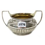 A George III silver twin handled sugar bowl,