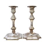 A pair of European large table candlesticks, of early 18th century design,