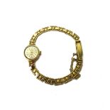 A lady's 9ct gold Swiss Empress bracelet wristwatch, the signed circular dial with baton numerals,