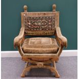 A 17th century style Italian 'X' frame chair with tapestry back, 70cm wide x 108cm high.