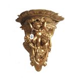 A giltwood carved figural wall bracket, 19th century,