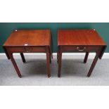 A pair of George II style mahogany drop-flap occasional tables, with single frieze drawer,