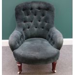 A Victorian button back easy chair, with bow seat on tapering fluted mahogany supports,
