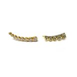 An 18ct gold and diamond set earring, by Jemma Wynne,