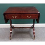 A Regency style mahogany sofa table with a pair of frieze drawers on four downswept supports,