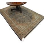 An Indian carpet of Persian design, 280cm x 184cm.