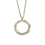 A gold and diamond set pendant, in a shaped circular openwork design,