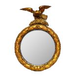 A 19th century gilt framed convex circular wall mirror,