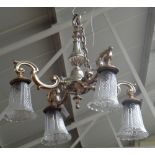 A pair of silvered metal four branch chandeliers, modern,