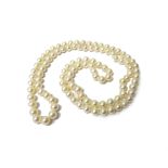 A single row necklace of uniform cultured pearls, approximate length 87cm.