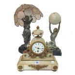 An Art Deco style table lamp formed as a woman, another lamp and an onyx mantel clock, (3).