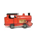 A child's red Triang 'puff puff' train and a group of large scale early 20th century toys, (qty).