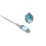 A 9ct white gold, blue topaz and diamond set ring,