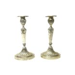 A pair of Victorian silver table candlesticks,